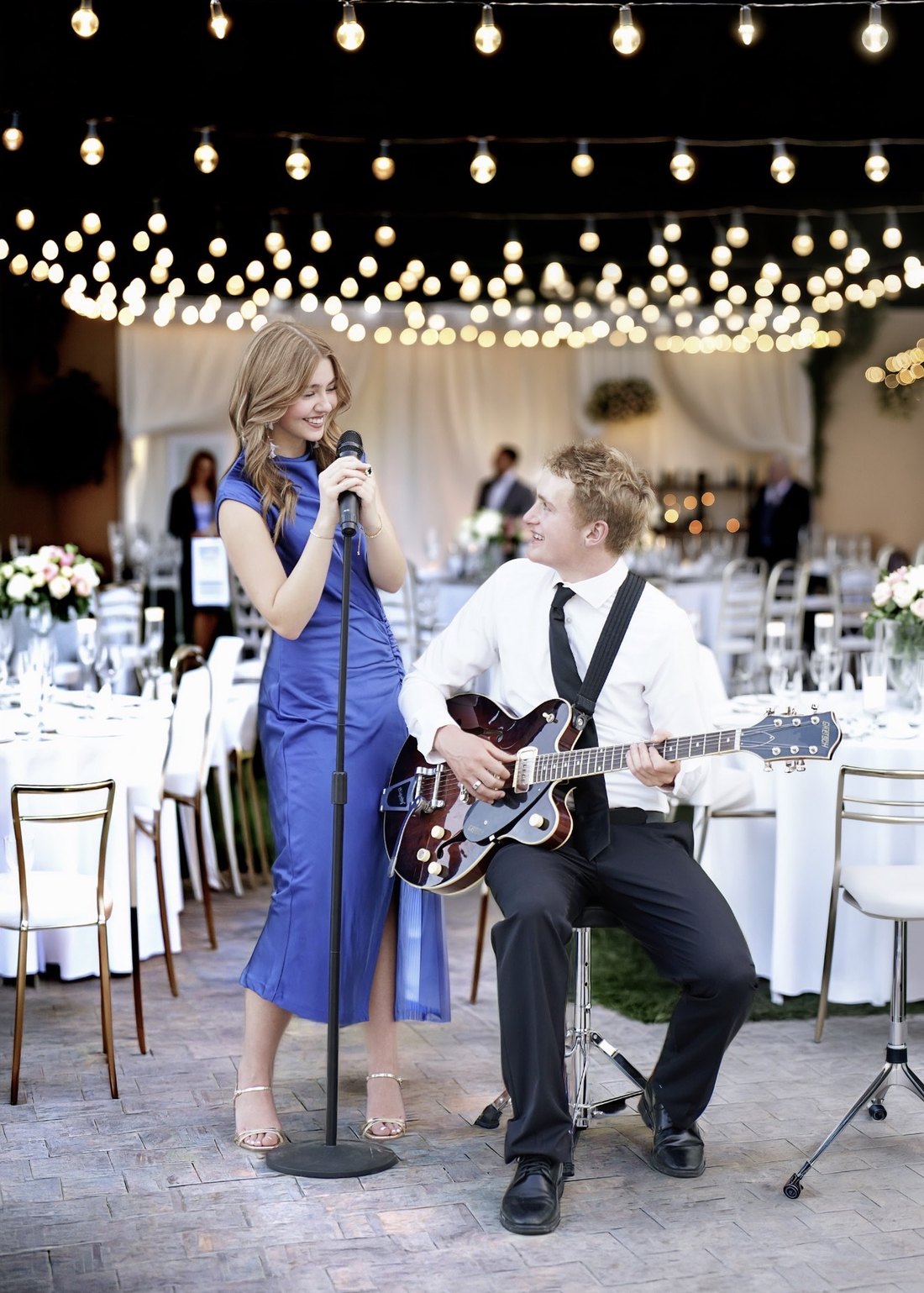 Performing at an indoor evening reception